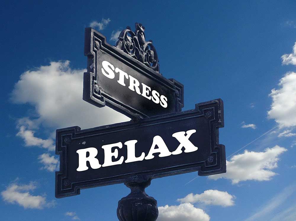 Signs saying "stress" and "relax" 